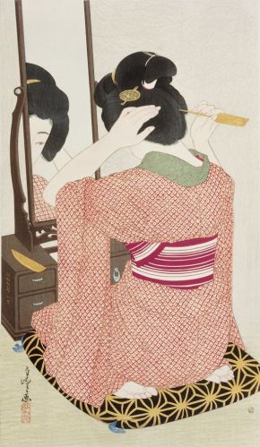 Woman in front of a mirror